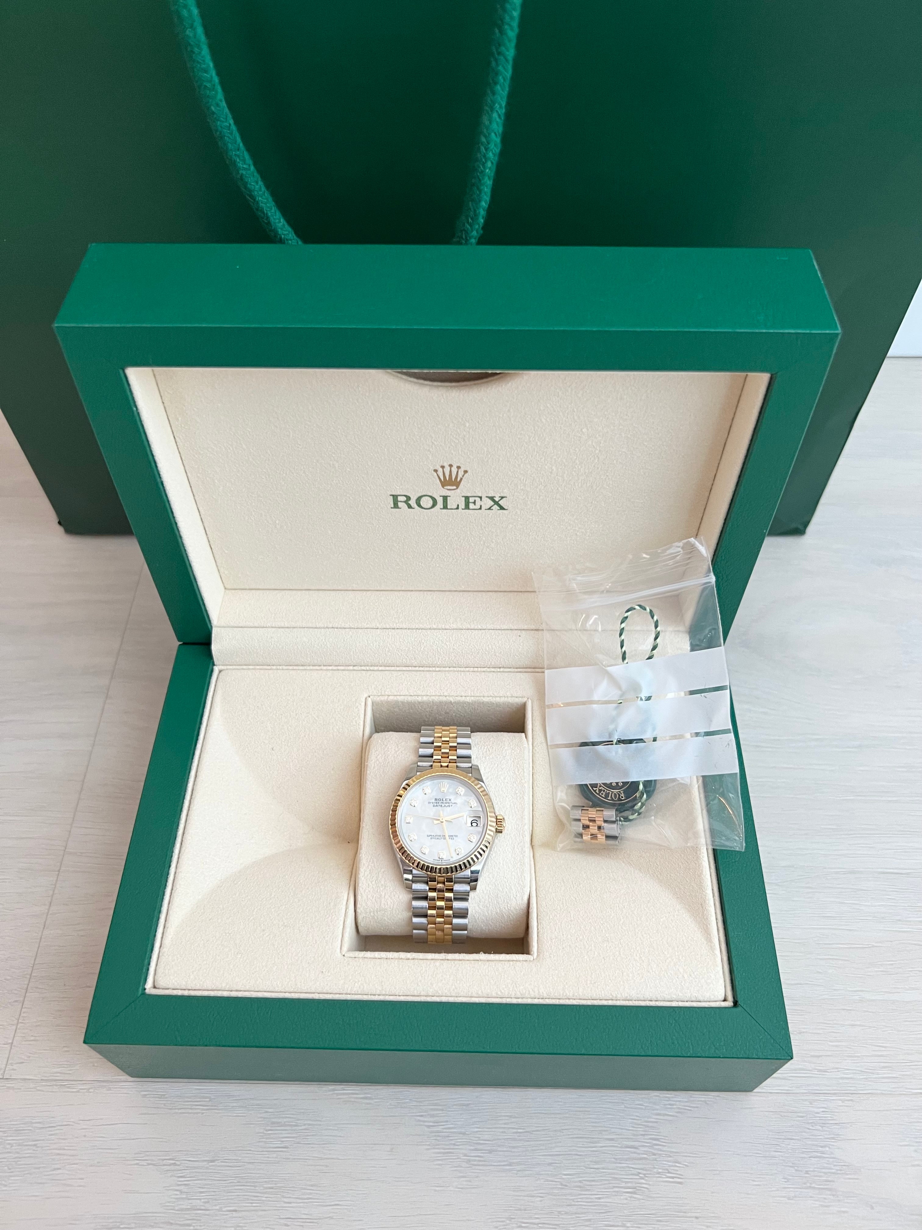 Rolex 31 mm two tone date just